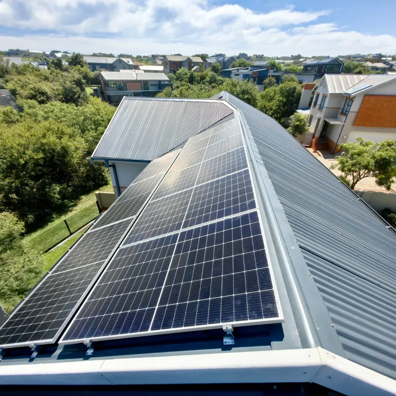 Residential Roof & Floor-Mounted Solar Installation photo 1